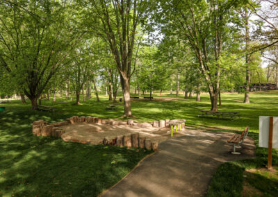 Childrens Sandbox surrounded by tree stumps at Mohawk Park in Brantford