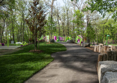 Asphalt walkway leading into childrens playground at Mohawk Park in Brantford