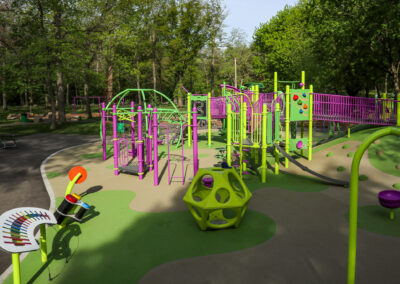 Green and purple playground with musical instrument at Mohawk Park in Brantford