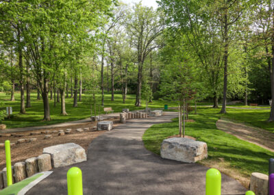 Pathway leading to Mohawk Park playground with armour stones in Brantford