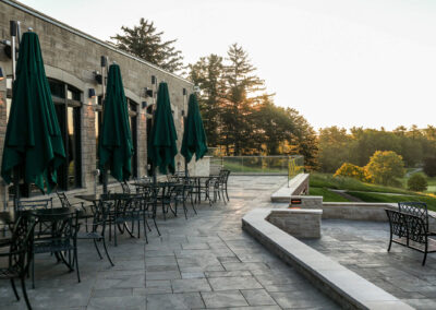HGCC patio with umbrella seating at sunset
