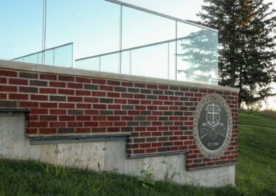 HGCC Crest in brick and stone