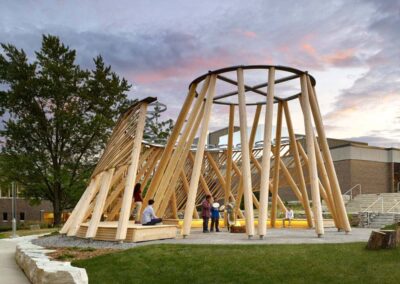 Wooden structure for an indigenous gathering place at sunset